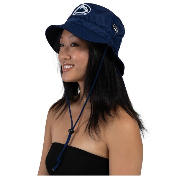 model wearing navy Hype and Vice waterproof bucket hat with Penn State Athletic Logo